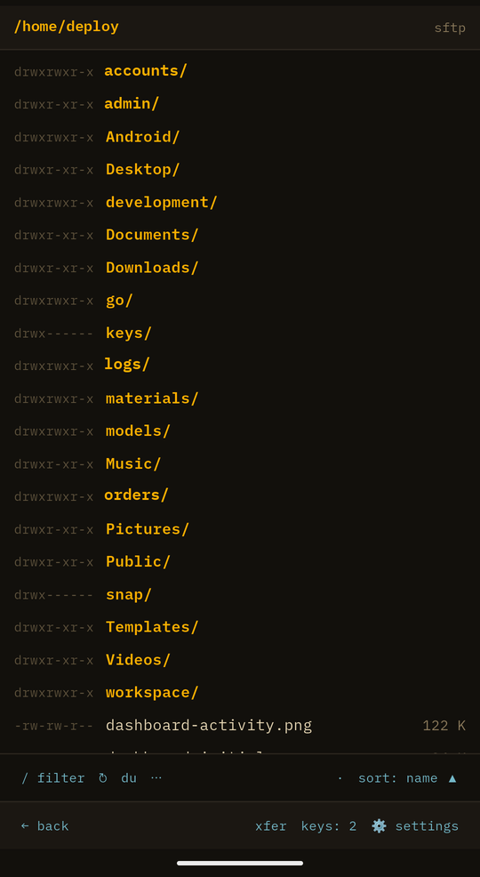 A remote directory listing over SFTP, with permission bits beside each name.